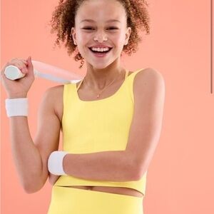 Athletic girl Rise above rib tank - Neon green